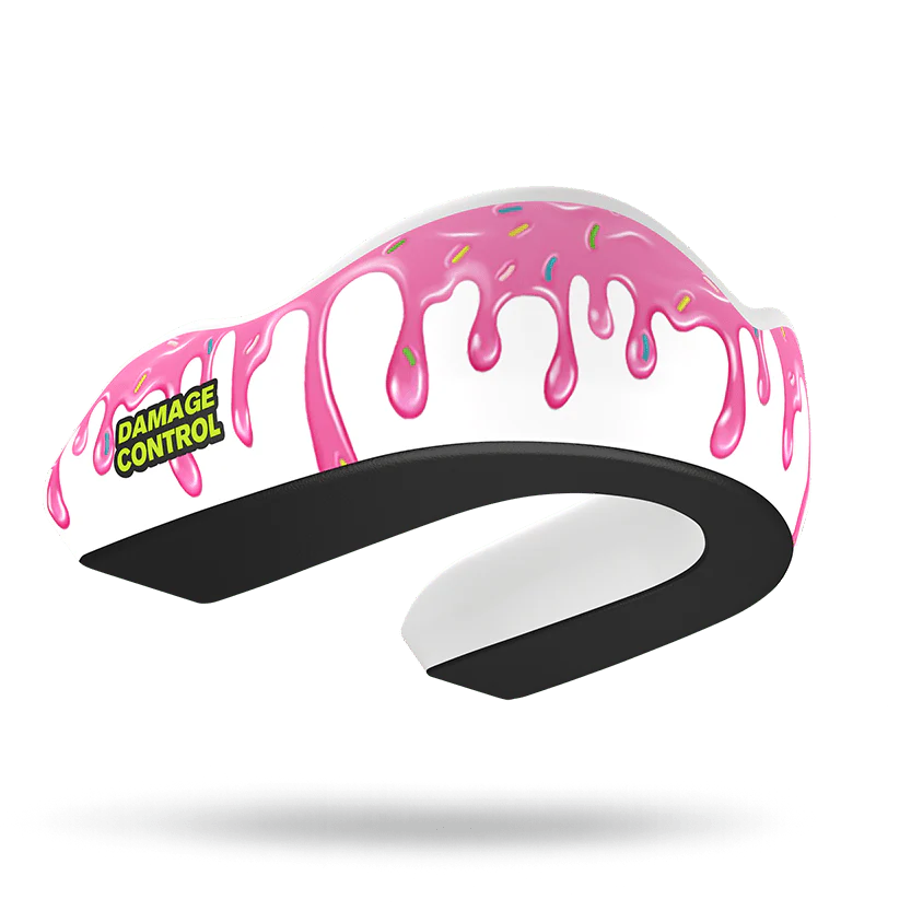 Black and white hair clip with pink 'Drip' design and 'Damage Control' label on a white background