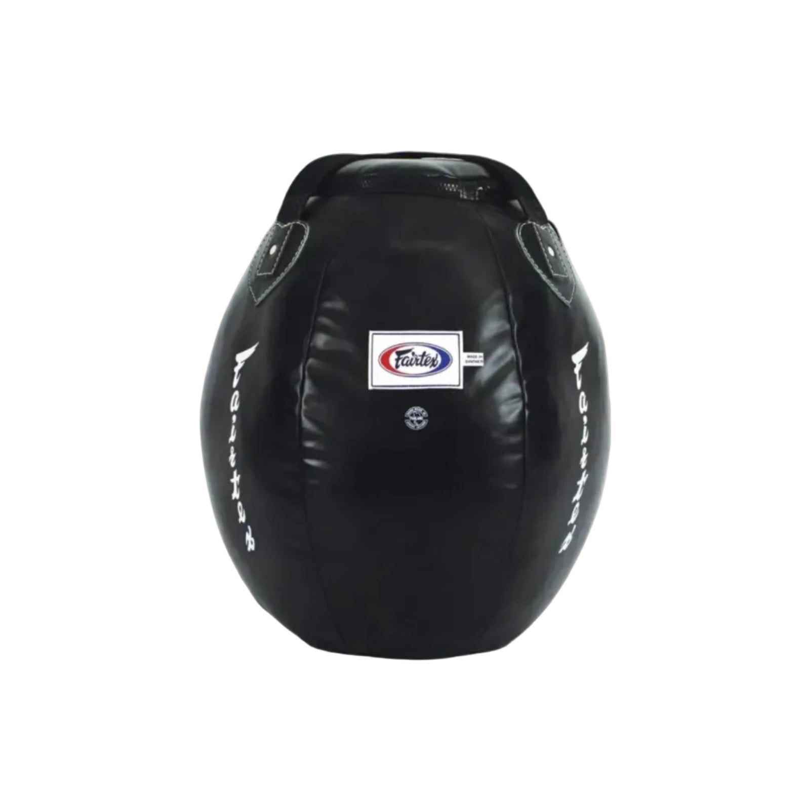 A black leather punching bag with a central Fairtex logo patch and white vertical branding text on both sides, photographed on a clean white background.