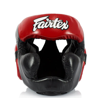 Red and black boxing helmet with 'Fairtex' branding on a white background