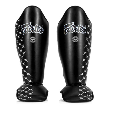 Black Fairtex shin guards with white patterned side panels
