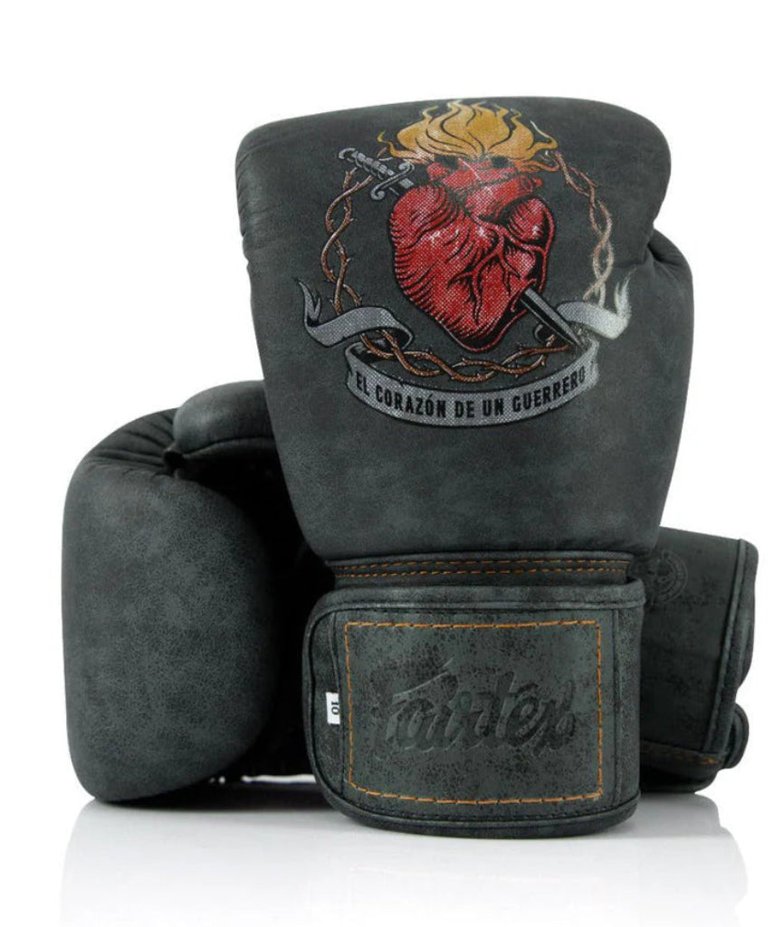 Gray boxing gloves with a heart design and 'Mizdef' branding on a white background