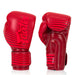 Red boxing gloves with 'Top King' branding on a white background