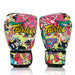 Colorful boxing gloves with 'Fairtex' branding on a white background