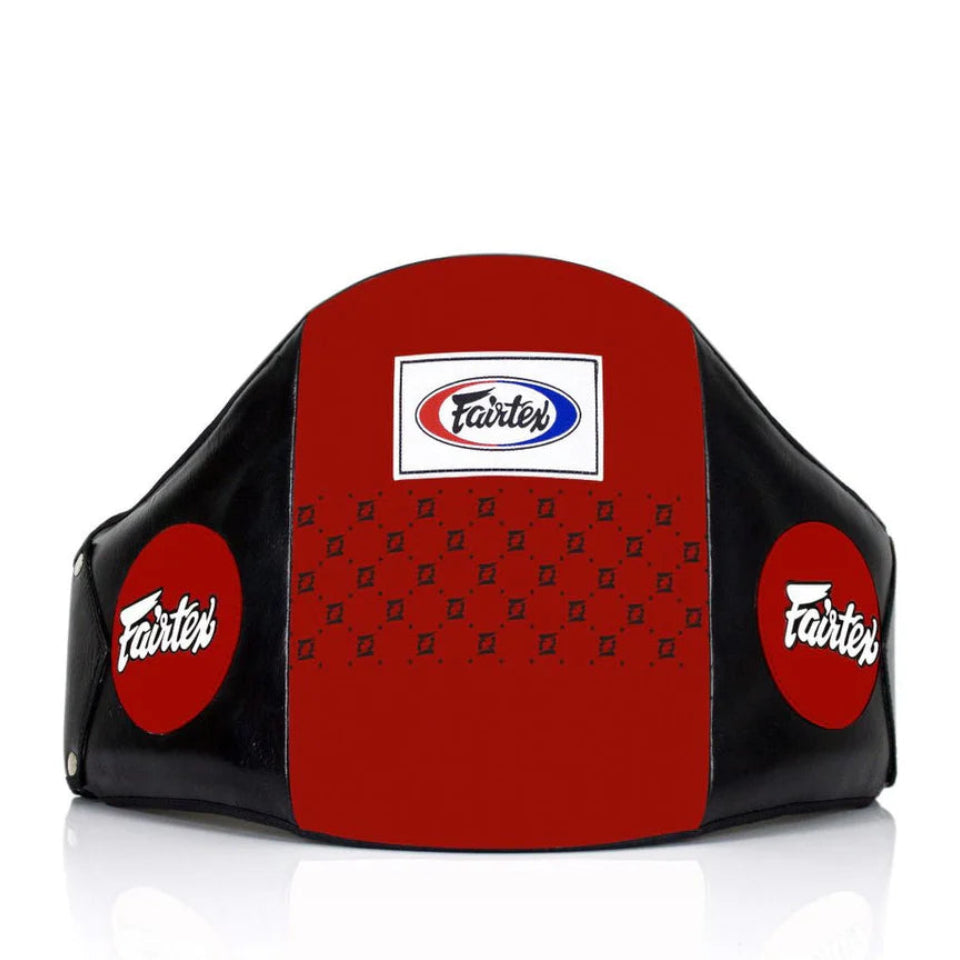 Red and black boxing headgear with Fairtex logo on a white background