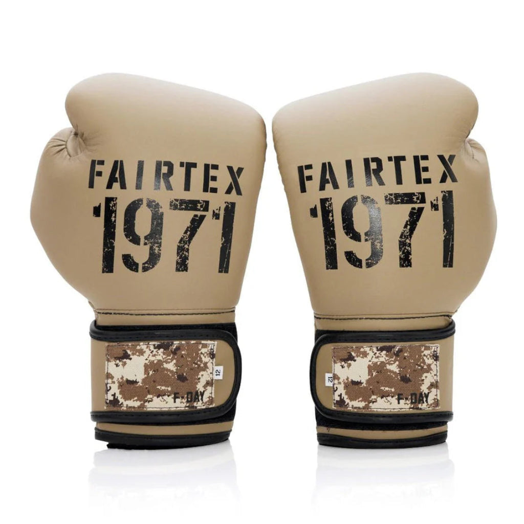 Pair of beige boxing gloves with 'Fairtex 1971' branding on a white background