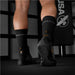 Boxer wearing black Hayabusa socks and boxing shoes