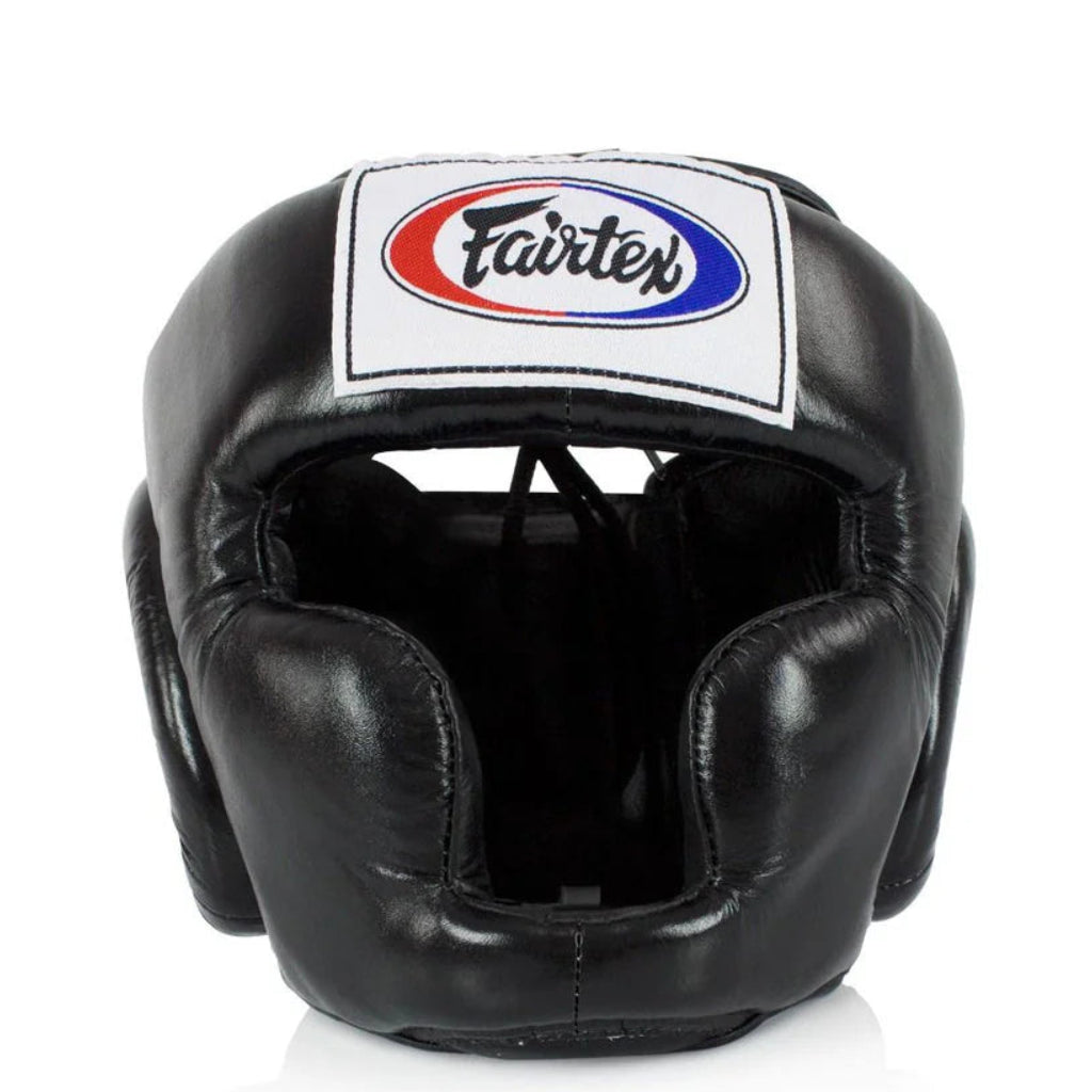 Black boxing headgear with Fairtex logo on a white background