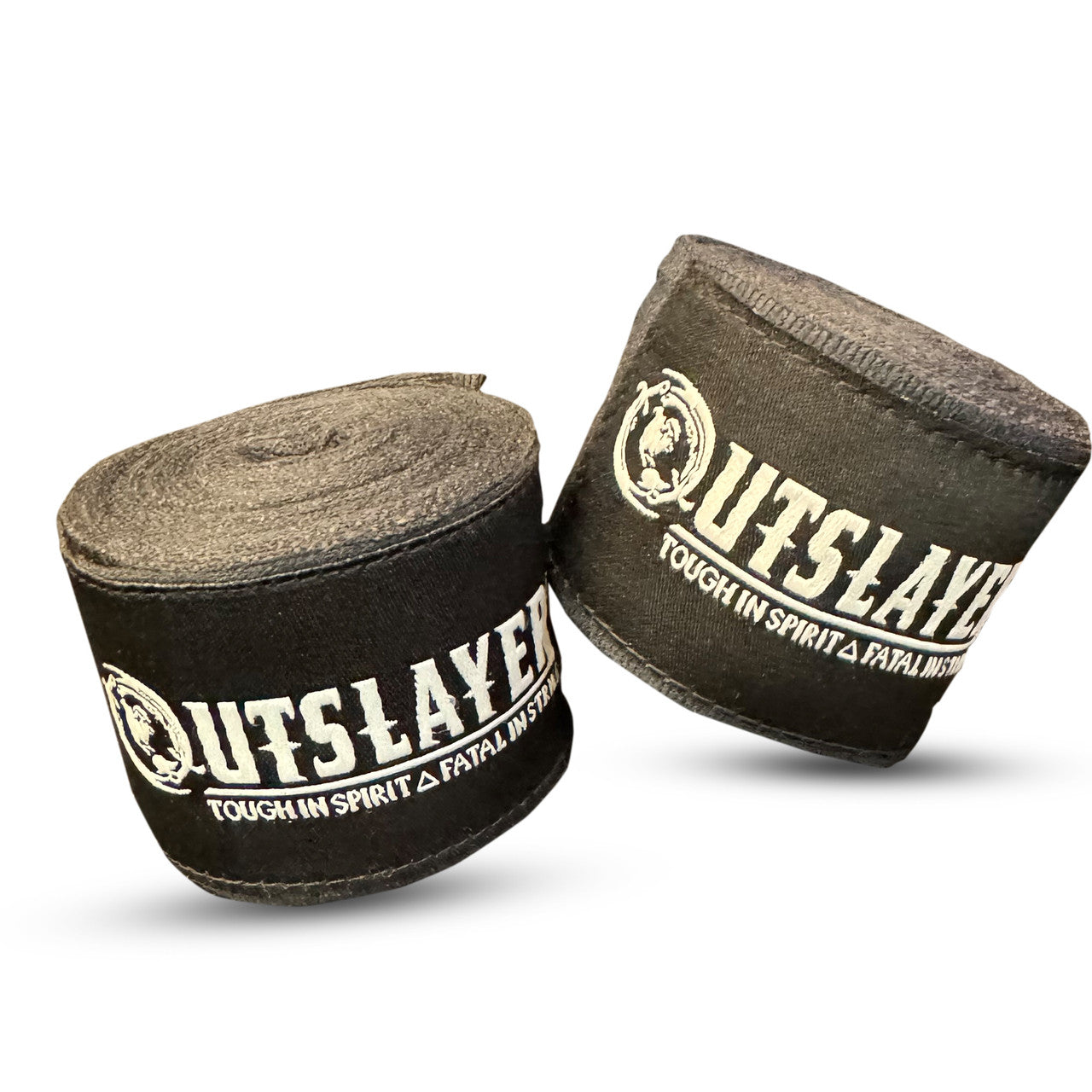 Pair of rolled black Outslayer hand wraps