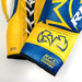 Yellow and blue boxing glove with brand logo on a white background