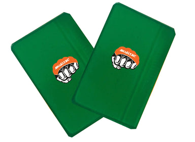 Two green boxing gel knuckle pads with a logo