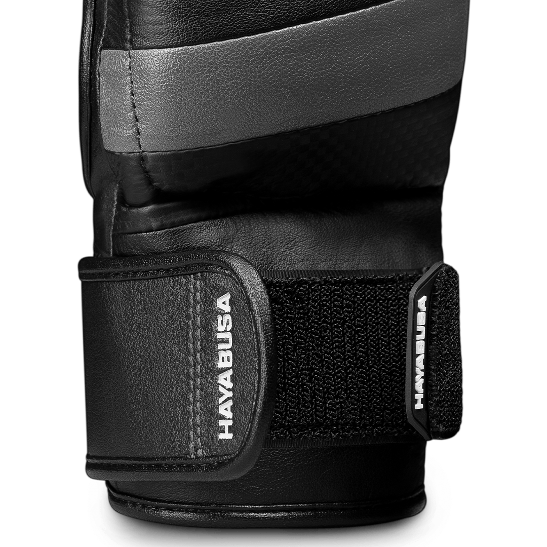 Black leather glove with visible Hayabusa branding on a black background