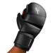 Black boxing glove with brand logo on a black background